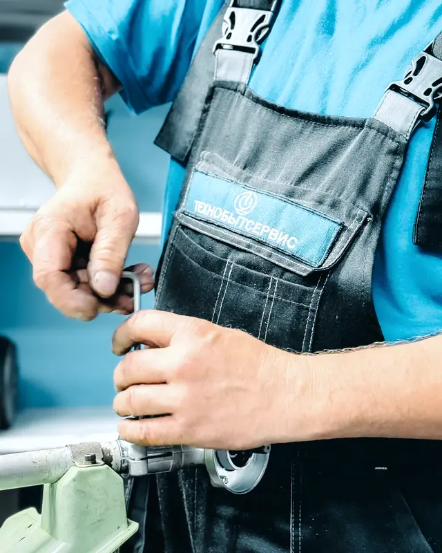 Journeyman plumber servicing a circulating pump during a call-out