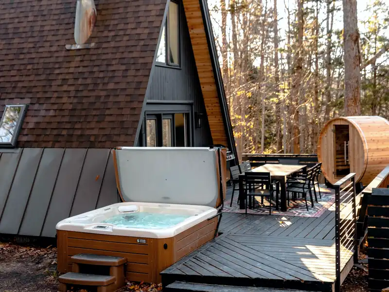 Cedar deck hot tub steaming on a cool West Coast evening